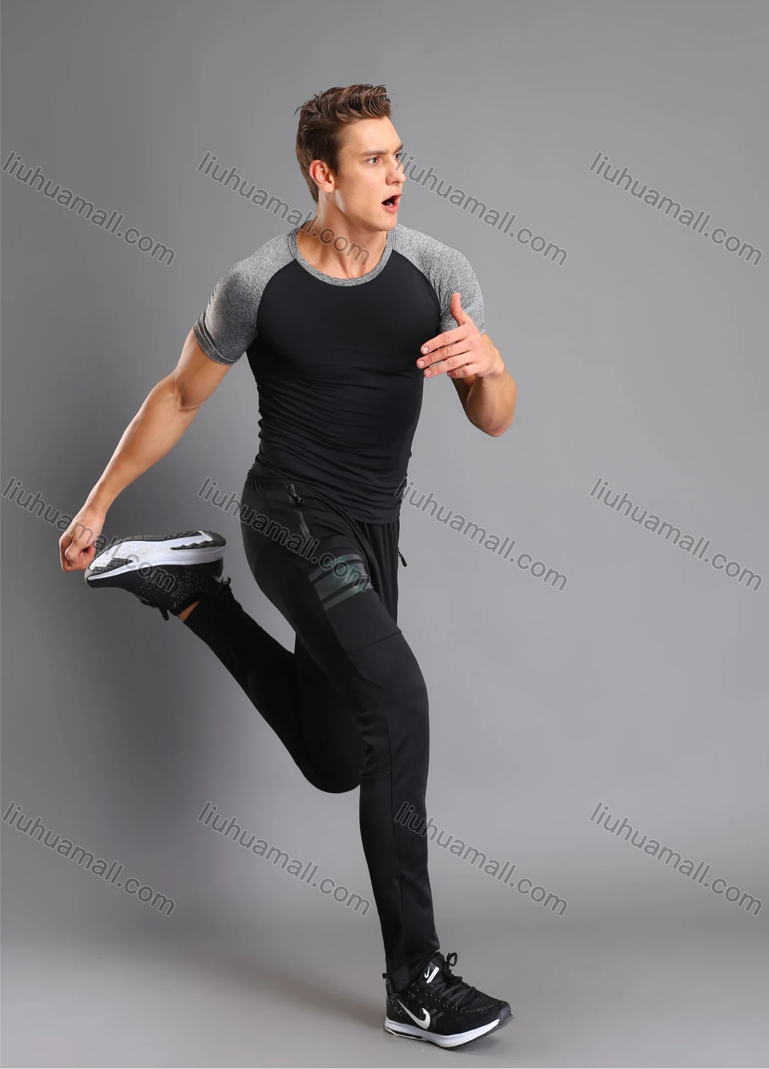 Wholesale Men's Athletic Workout Breathable Splicing Quick Dry Fitness Short Sleeve T-shirt JS12002# - Liuhuamall