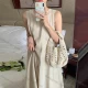 Wholesale 2026 New French Hepburn Style Dress, Women Summer Unique Black Sleeveless Hollow Out Back Tank Dress Ivory Clothing Wholesale Market Liuhua