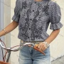 Wholesale Women's Trendy Gingham Puff Sleeve Blouse Stylish Design with Floral Embroidery and Button Closure preview