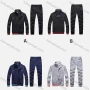 Wholesale Men's Athletic Workout Striped Stand Neck Zip Jacket & Elastic Waist Ankle Length Joggers 2 Piece Set 9973# preview