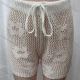Wholesale Women's Vacation Hollow Out Semi-Sheer Drawstring Plain Floral Design Shorts 80318# White Clothing Wholesale Market Liuhua