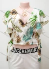 Wholesale Women's Casual Leaf Print V Neck Ruffle Trim Lace Up Crop Blouse - Liuhuamall