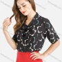 Wholesale Women's Tie-Neck Short Sleeve Abstract Print Top preview