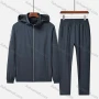 Wholesale Men's Sporty Zipper Pockets Striped Hooded Jacket & Pants Set preview