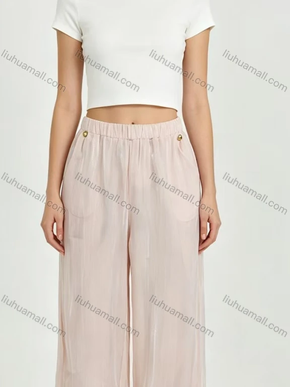 Wholesale Shimmery pale pink harem pants with elastic waist, side pockets and gold button decor. Lightweight flowy fabric, relaxed