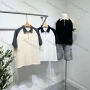 Wholesale Men's Casual Plain Collared Quarter Zip Raglan Short Sleeve Henley Shirt E90063# preview