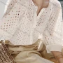 Wholesale Women's Casual Plain 3/4 Sleeve Crew Neck Hollow Out Button Down Blouse preview