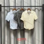 Wholesale Short shirt with short sleeves, featuring a lace hollow-out design at the back, casual, versatile, and fashionable preview