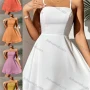 Wholesale Women's Spaghetti Strap Open Back Lace Up Ruffle Hem Plain Cami Dress AY233# preview