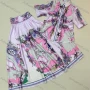 Wholesale Women's Fashion Printed Shirt and Skirt 2-piece Set preview