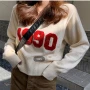 Wholesale Women's Casual V Neck Long Sleeve Flock Print Knit Blouse 8149# preview