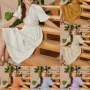 Wholesale Women's Casual Wrap V Neck Lantern Sleeve Texture Swiss Dot Bow Tie Back Layered Midi Dress A1309-0210# preview