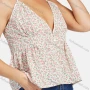 Wholesale Women's V Neck Back Cross Strap Floral Print Ruffle Hem Cami Top preview