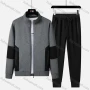 Wholesale Men's Sporty Stand Collar Zipper Pockets Colorblock Jacket & Drawstring Pants Set preview