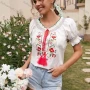 Wholesale Women's Boho Keyhole Neck Drawstring Fringe Trim Ruffle Floral Embroidery Blouse preview