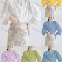 Wholesale Women's Casual Bishop Sleeve Wrap V Neck Side Button Ruched Plain Blouse 430292# preview