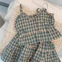 Wholesale Girls Casual Gingham Ruched Ruffle Trim Cami Top & Ruffle Hem Skirt Sets preview