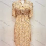 Wholesale Women's Casual Turn-down Collar Buttons Front Drawstring Floral Print Ruffle Curved Hem Midi Dress preview