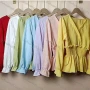 Wholesale Women's Casual V Neck Ruffle Hem Plain Shirred Wrap Blouse preview